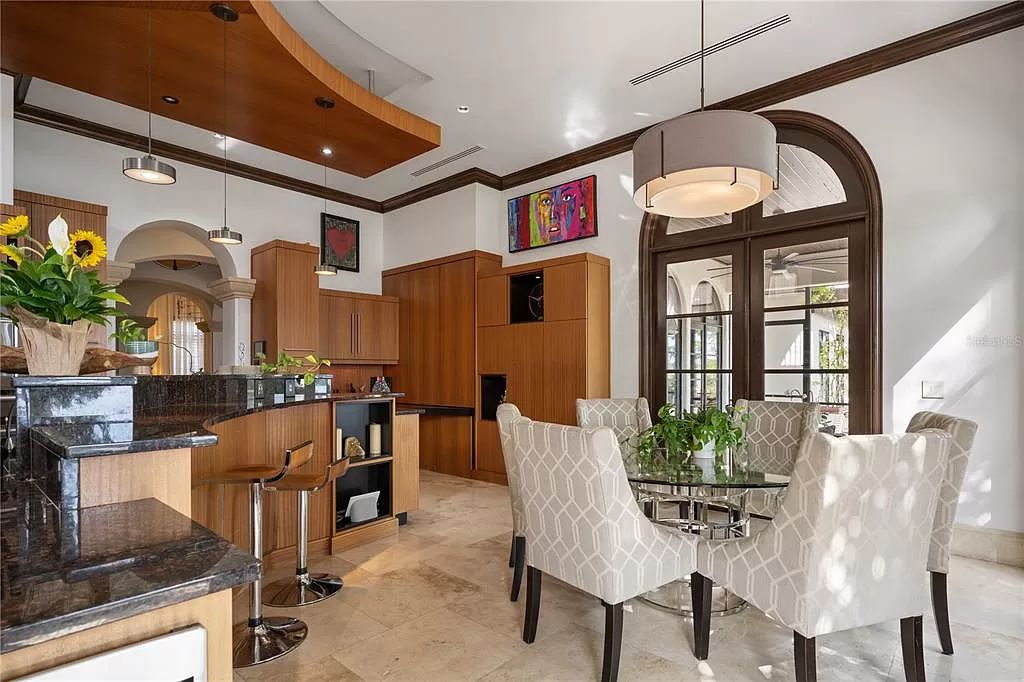 Introducing a rare opportunity to own a unique lakeside property on Lake Maitland, part of the prestigious Chain of Lakes.