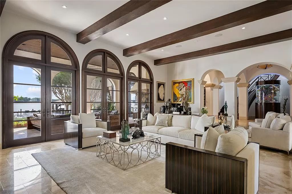 Introducing a rare opportunity to own a unique lakeside property on Lake Maitland, part of the prestigious Chain of Lakes.