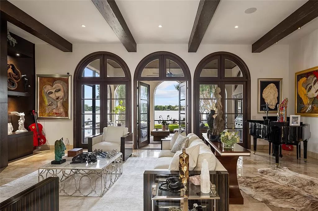 Introducing a rare opportunity to own a unique lakeside property on Lake Maitland, part of the prestigious Chain of Lakes.