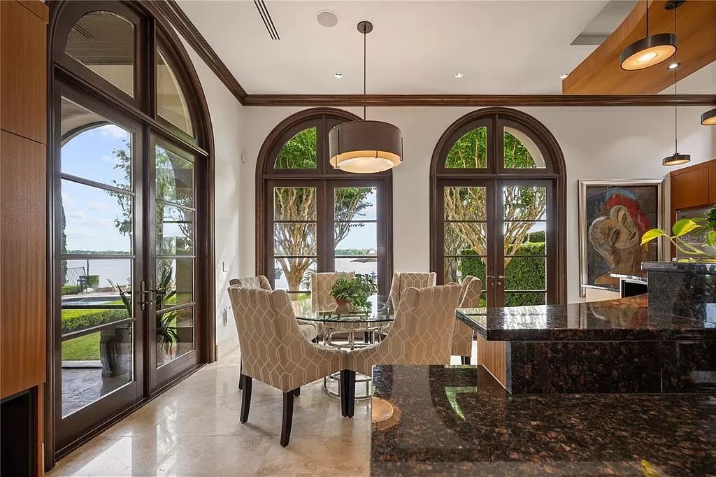 Introducing a rare opportunity to own a unique lakeside property on Lake Maitland, part of the prestigious Chain of Lakes.