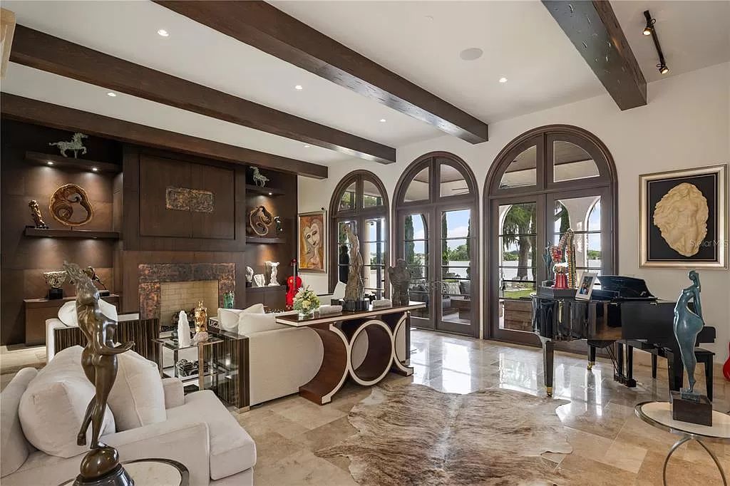 Introducing a rare opportunity to own a unique lakeside property on Lake Maitland, part of the prestigious Chain of Lakes.