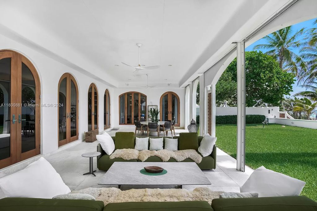 This 11,599 square feet estate on a 41,750 square feet lot includes 150 feet of private ocean frontage.