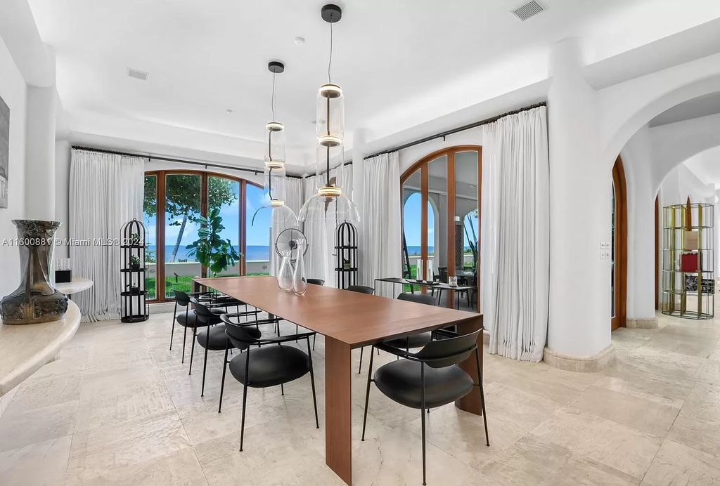 This 11,599 square feet estate on a 41,750 square feet lot includes 150 feet of private ocean frontage.