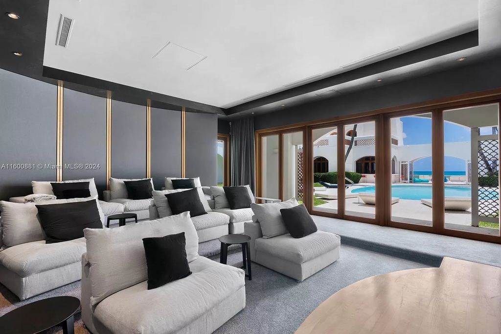 This 11,599 square feet estate on a 41,750 square feet lot includes 150 feet of private ocean frontage.