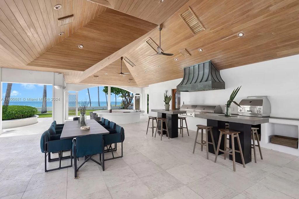 This 11,599 square feet estate on a 41,750 square feet lot includes 150 feet of private ocean frontage.