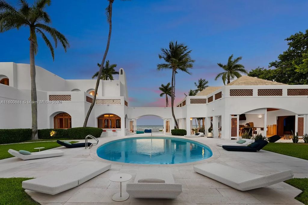 This 11,599 square feet estate on a 41,750 square feet lot includes 150 feet of private ocean frontage.