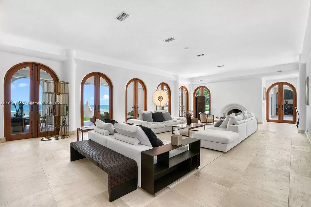 This 11,599 square feet estate on a 41,750 square feet lot includes 150 feet of private ocean frontage.