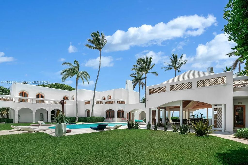 This 11,599 square feet estate on a 41,750 square feet lot includes 150 feet of private ocean frontage.