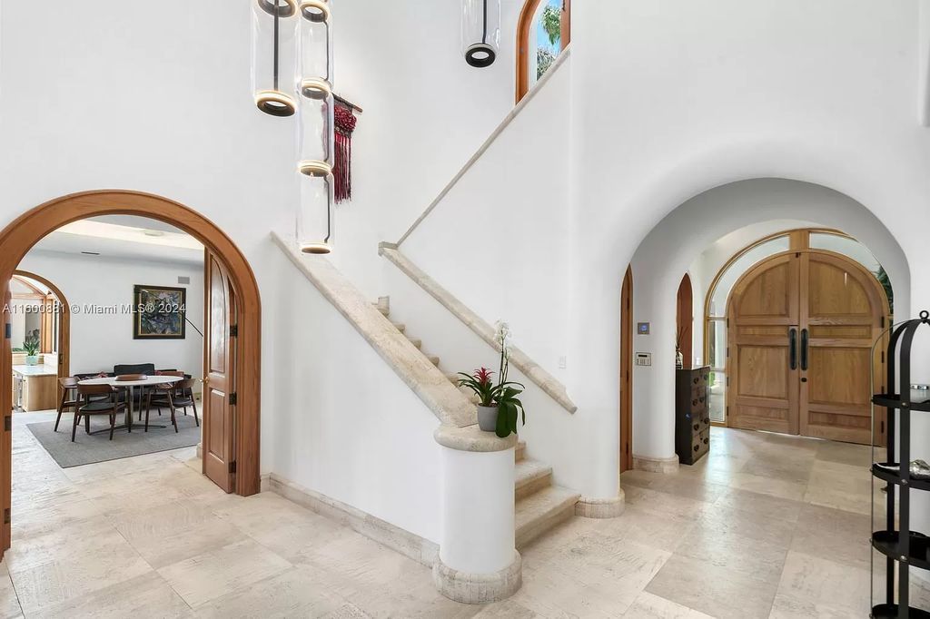 This 11,599 square feet estate on a 41,750 square feet lot includes 150 feet of private ocean frontage.