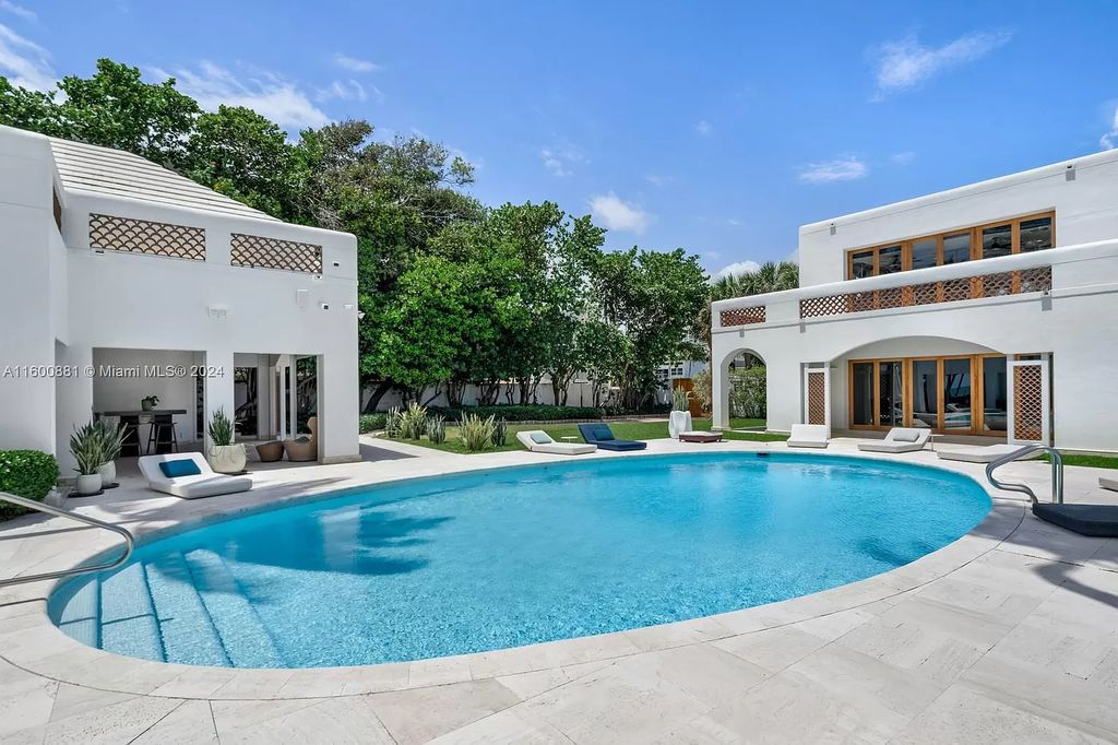 This 11,599 square feet estate on a 41,750 square feet lot includes 150 feet of private ocean frontage.
