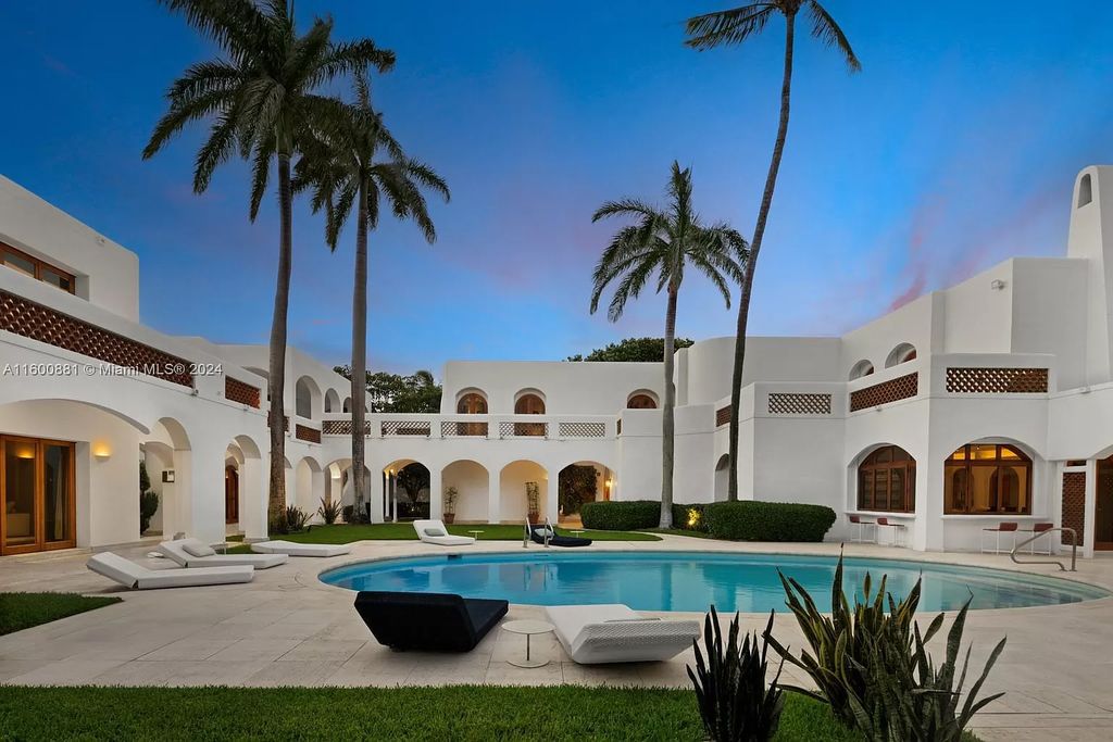 This 11,599 square feet estate on a 41,750 square feet lot includes 150 feet of private ocean frontage.