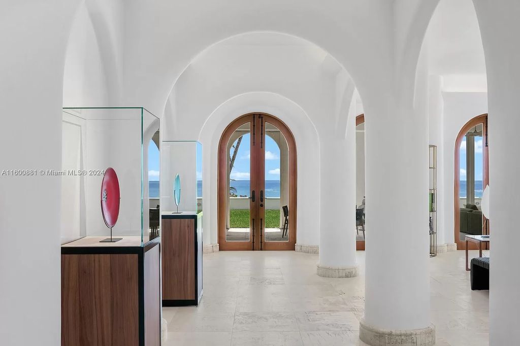 This 11,599 square feet estate on a 41,750 square feet lot includes 150 feet of private ocean frontage.