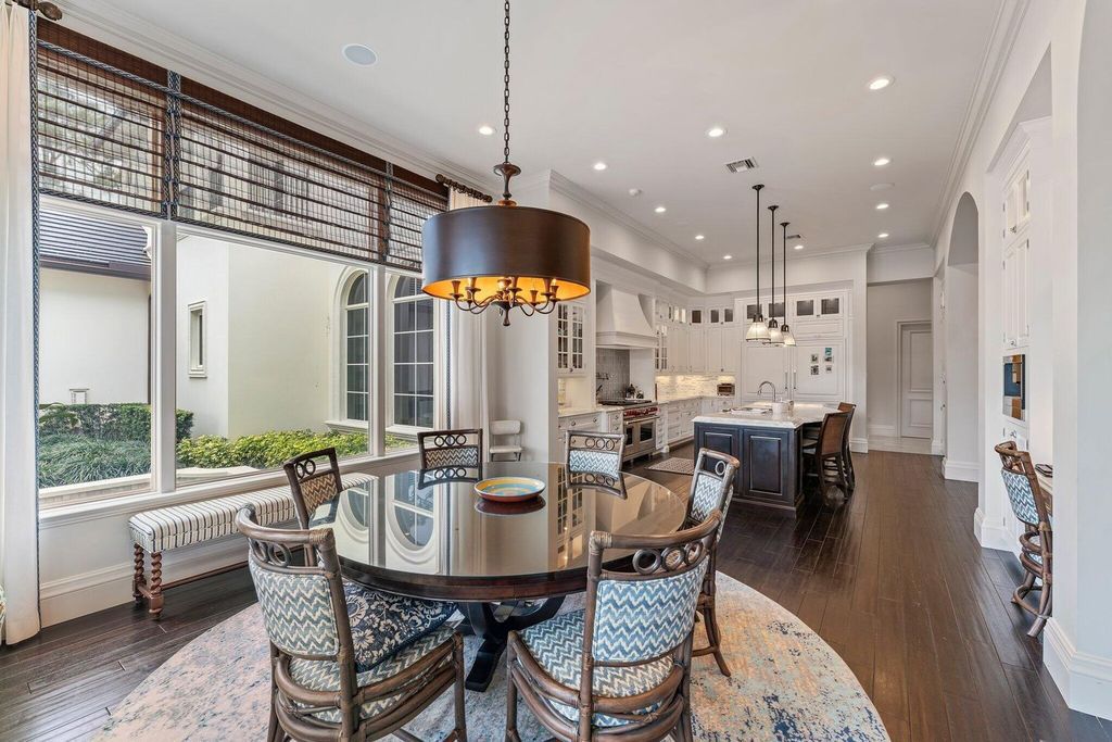 Welcome to 107 W Bears Club Dr, an exquisite custom-built estate in the exclusive Bears Club community in Jupiter, Florida.
