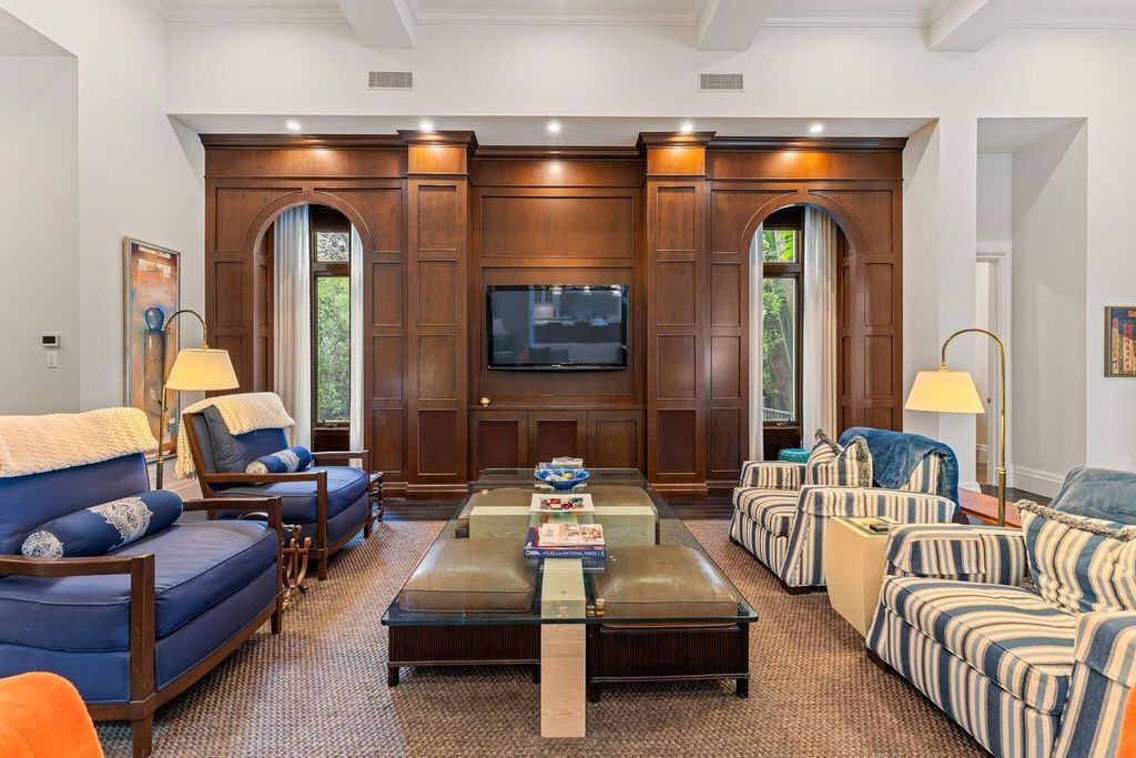 Welcome to 107 W Bears Club Dr, an exquisite custom-built estate in the exclusive Bears Club community in Jupiter, Florida.