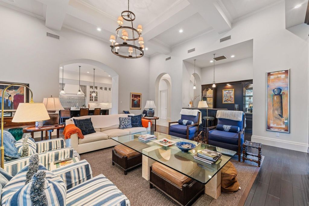 Welcome to 107 W Bears Club Dr, an exquisite custom-built estate in the exclusive Bears Club community in Jupiter, Florida.
