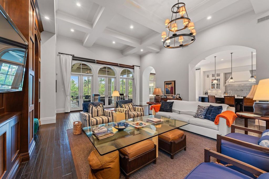Welcome to 107 W Bears Club Dr, an exquisite custom-built estate in the exclusive Bears Club community in Jupiter, Florida.