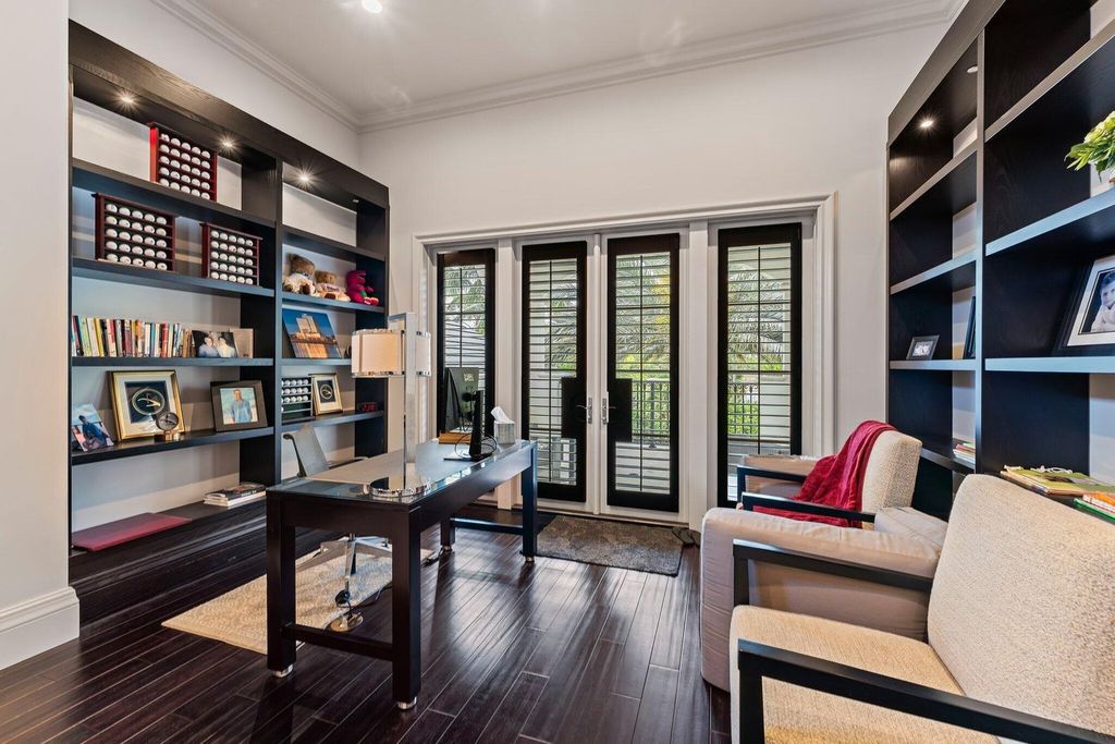 Welcome to 107 W Bears Club Dr, an exquisite custom-built estate in the exclusive Bears Club community in Jupiter, Florida.