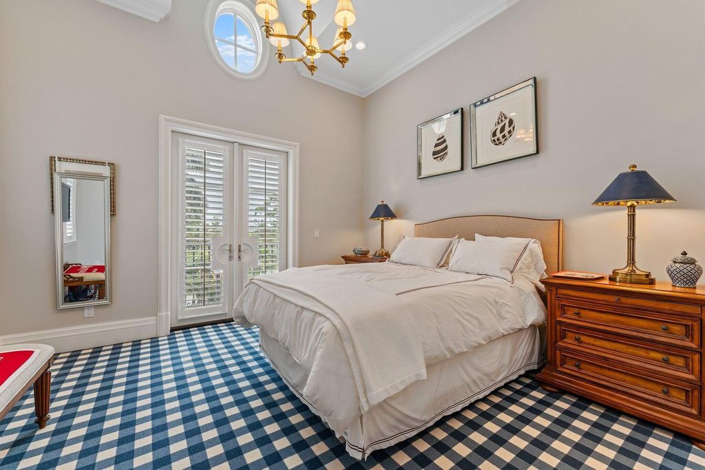 Welcome to 107 W Bears Club Dr, an exquisite custom-built estate in the exclusive Bears Club community in Jupiter, Florida.