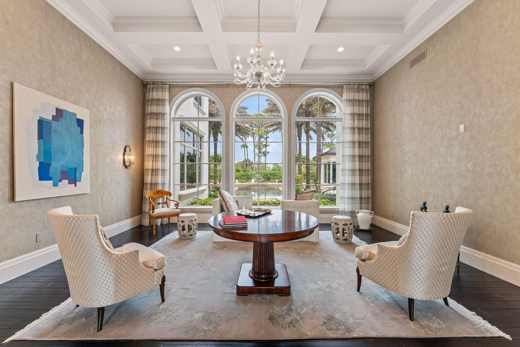 Welcome to 107 W Bears Club Dr, an exquisite custom-built estate in the exclusive Bears Club community in Jupiter, Florida.