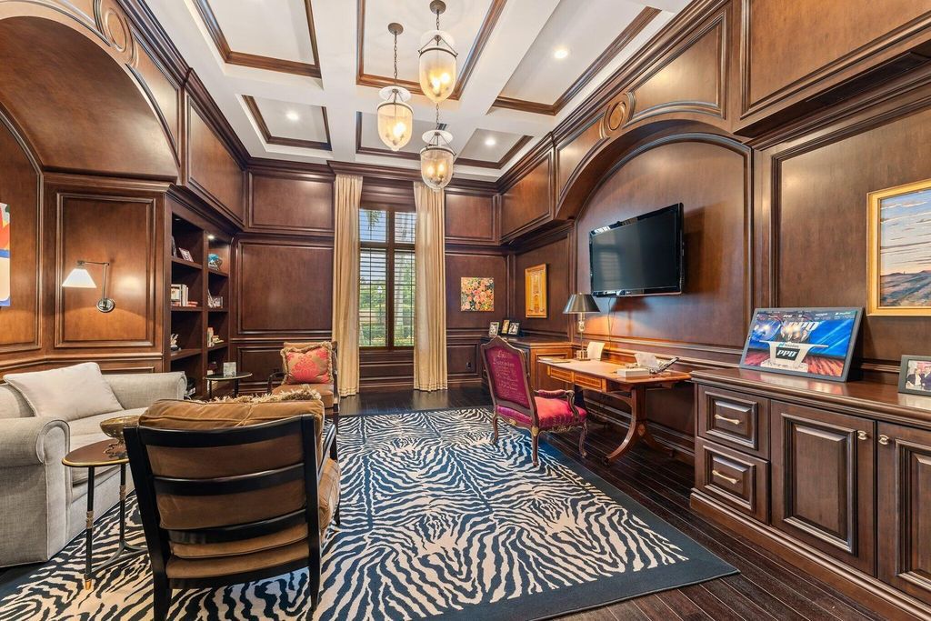Welcome to 107 W Bears Club Dr, an exquisite custom-built estate in the exclusive Bears Club community in Jupiter, Florida.