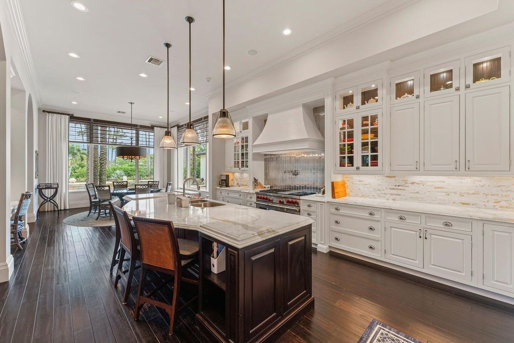 Welcome to 107 W Bears Club Dr, an exquisite custom-built estate in the exclusive Bears Club community in Jupiter, Florida.