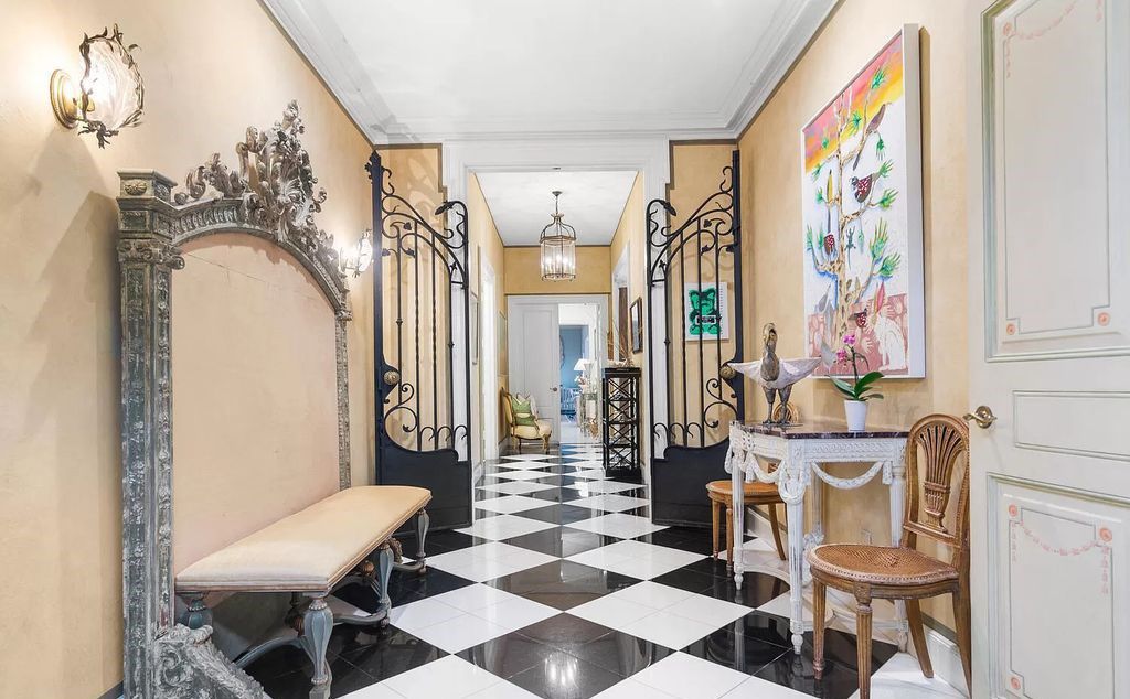 Designed by renowned architect John Volk, this magnificent residence, "The Ballroom," features 6 bedrooms, 6 bathrooms, and 5,612 square feet of living space on a 0.43-acre lot.