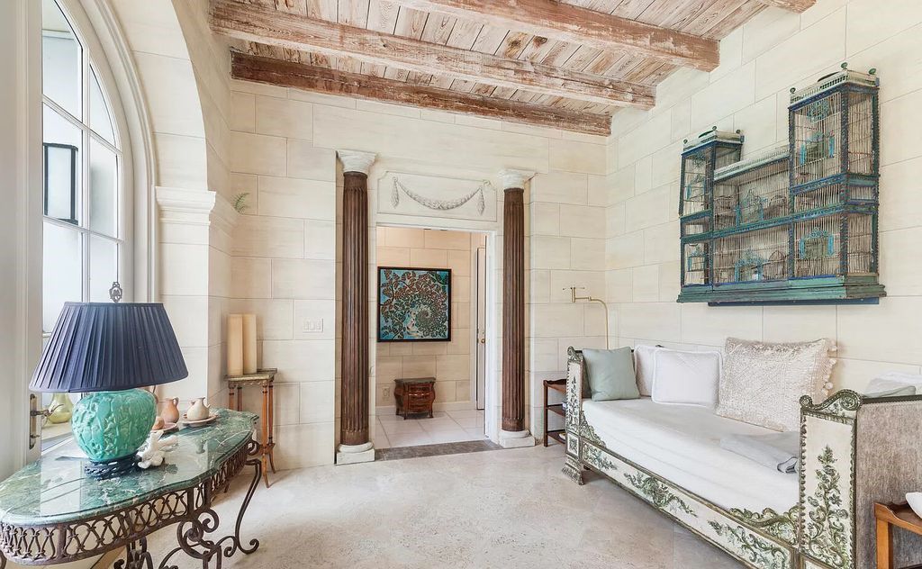 Designed by renowned architect John Volk, this magnificent residence, "The Ballroom," features 6 bedrooms, 6 bathrooms, and 5,612 square feet of living space on a 0.43-acre lot.