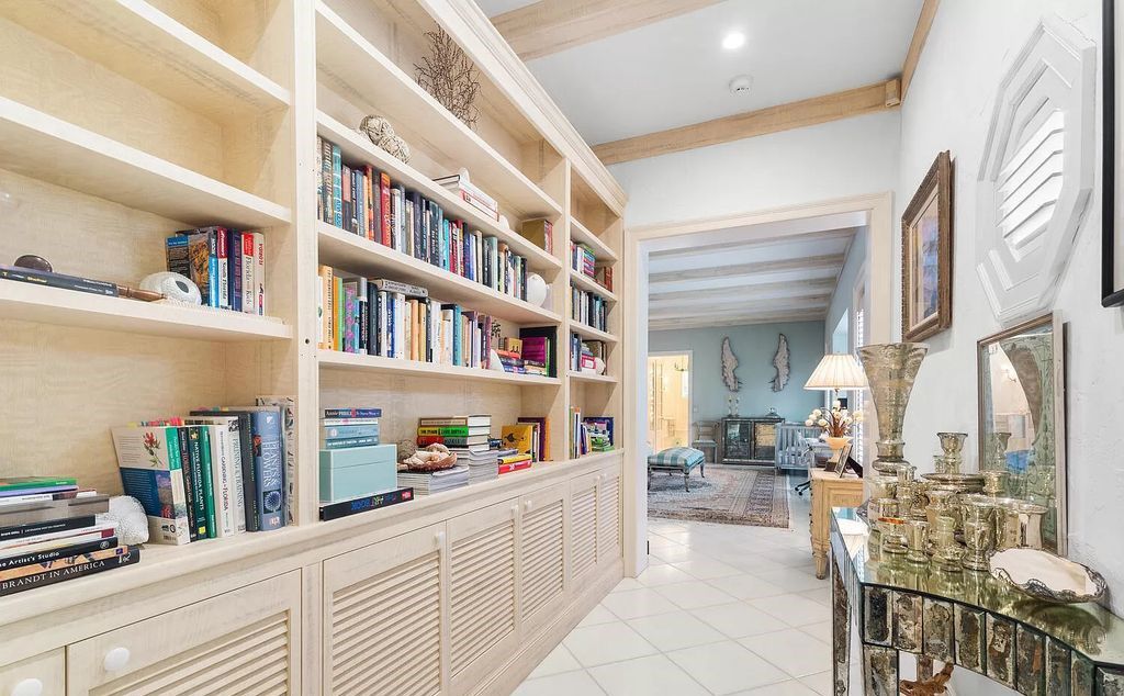 Designed by renowned architect John Volk, this magnificent residence, "The Ballroom," features 6 bedrooms, 6 bathrooms, and 5,612 square feet of living space on a 0.43-acre lot.