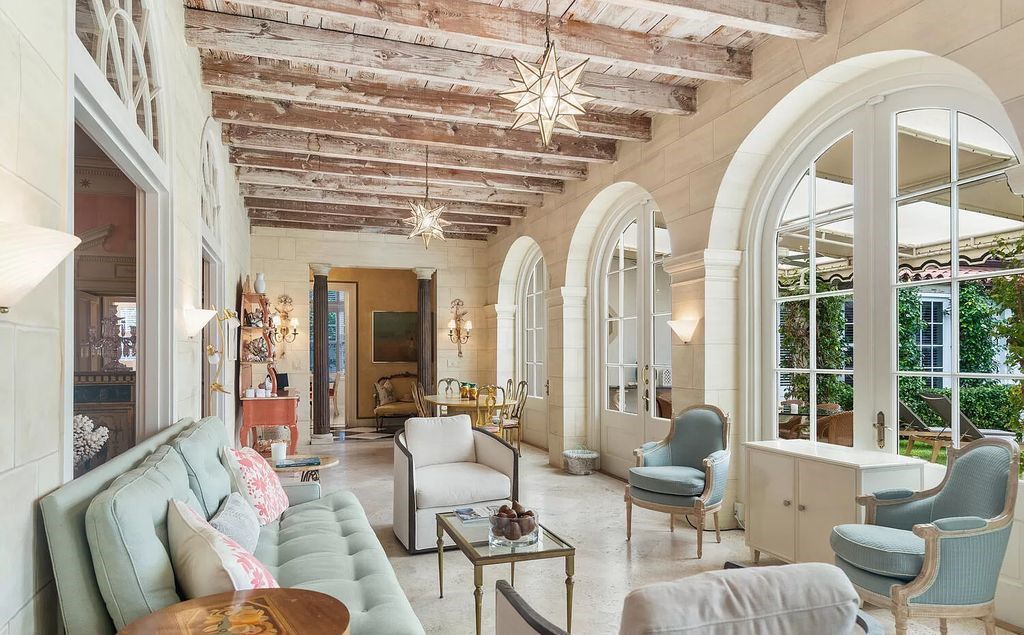 Designed by renowned architect John Volk, this magnificent residence, "The Ballroom," features 6 bedrooms, 6 bathrooms, and 5,612 square feet of living space on a 0.43-acre lot.
