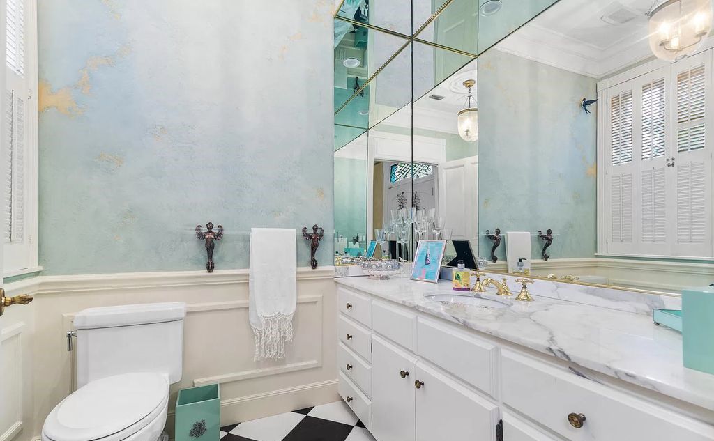 Designed by renowned architect John Volk, this magnificent residence, "The Ballroom," features 6 bedrooms, 6 bathrooms, and 5,612 square feet of living space on a 0.43-acre lot.