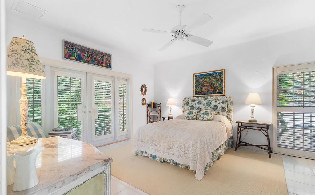 Designed by renowned architect John Volk, this magnificent residence, "The Ballroom," features 6 bedrooms, 6 bathrooms, and 5,612 square feet of living space on a 0.43-acre lot.