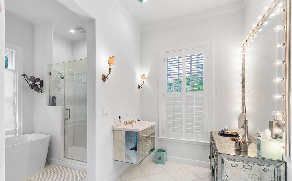 Designed by renowned architect John Volk, this magnificent residence, "The Ballroom," features 6 bedrooms, 6 bathrooms, and 5,612 square feet of living space on a 0.43-acre lot.