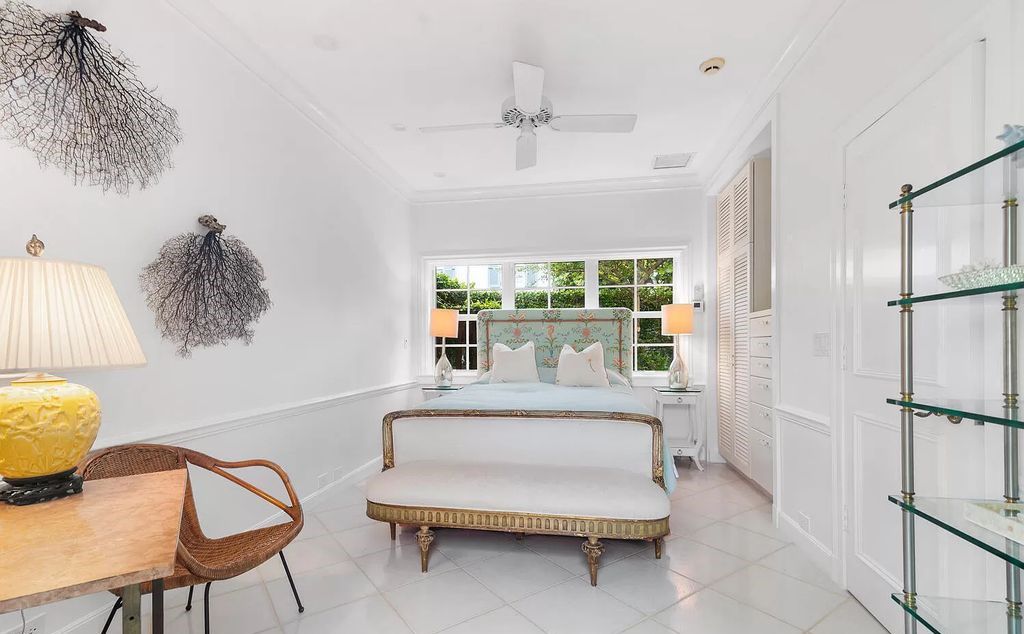 Designed by renowned architect John Volk, this magnificent residence, "The Ballroom," features 6 bedrooms, 6 bathrooms, and 5,612 square feet of living space on a 0.43-acre lot.