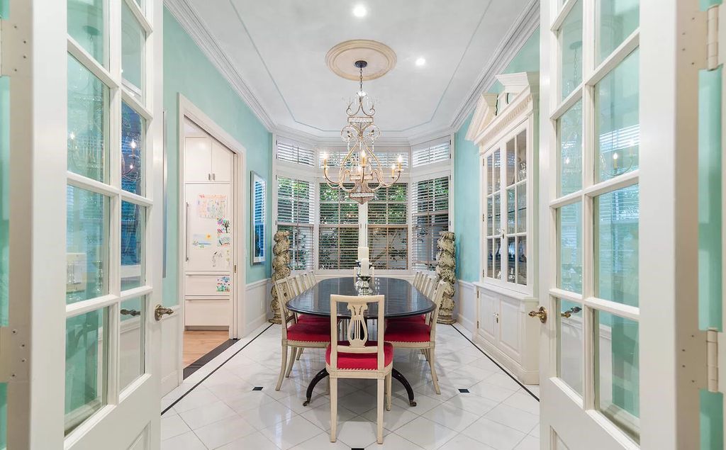 Designed by renowned architect John Volk, this magnificent residence, "The Ballroom," features 6 bedrooms, 6 bathrooms, and 5,612 square feet of living space on a 0.43-acre lot.