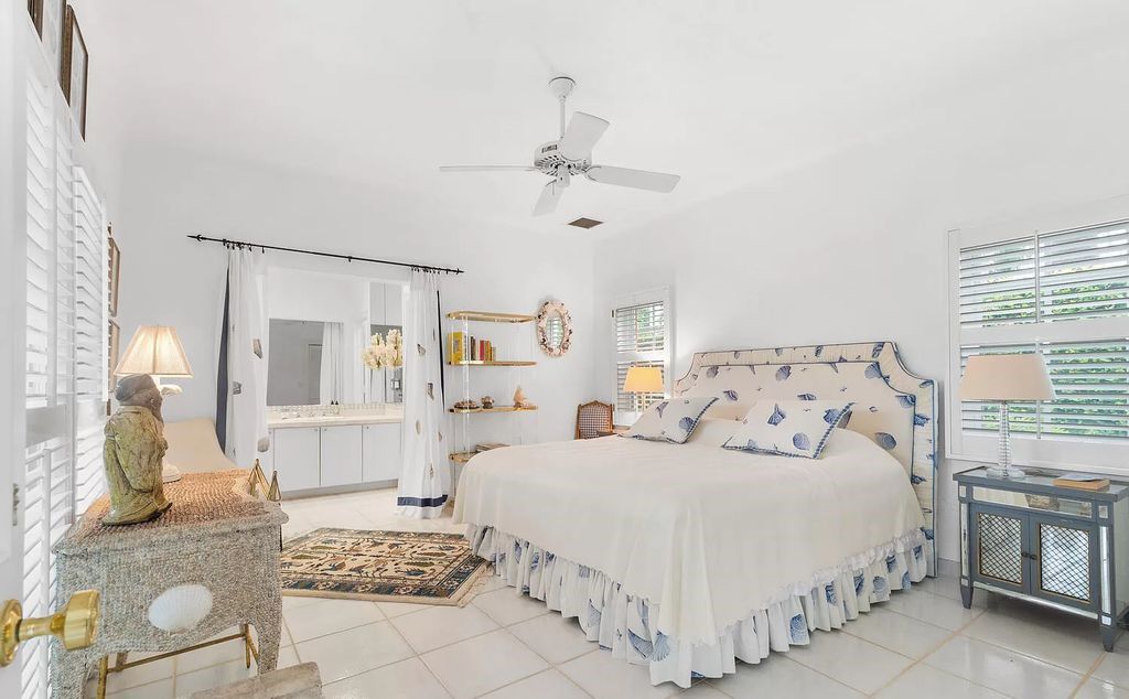 Designed by renowned architect John Volk, this magnificent residence, "The Ballroom," features 6 bedrooms, 6 bathrooms, and 5,612 square feet of living space on a 0.43-acre lot.