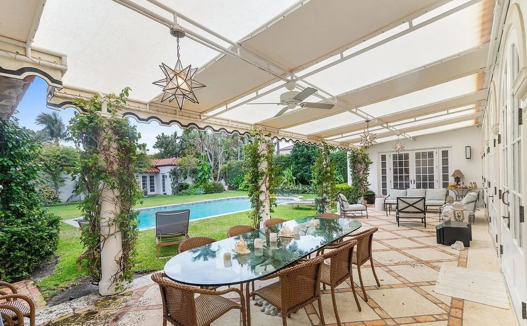Designed by renowned architect John Volk, this magnificent residence, "The Ballroom," features 6 bedrooms, 6 bathrooms, and 5,612 square feet of living space on a 0.43-acre lot.