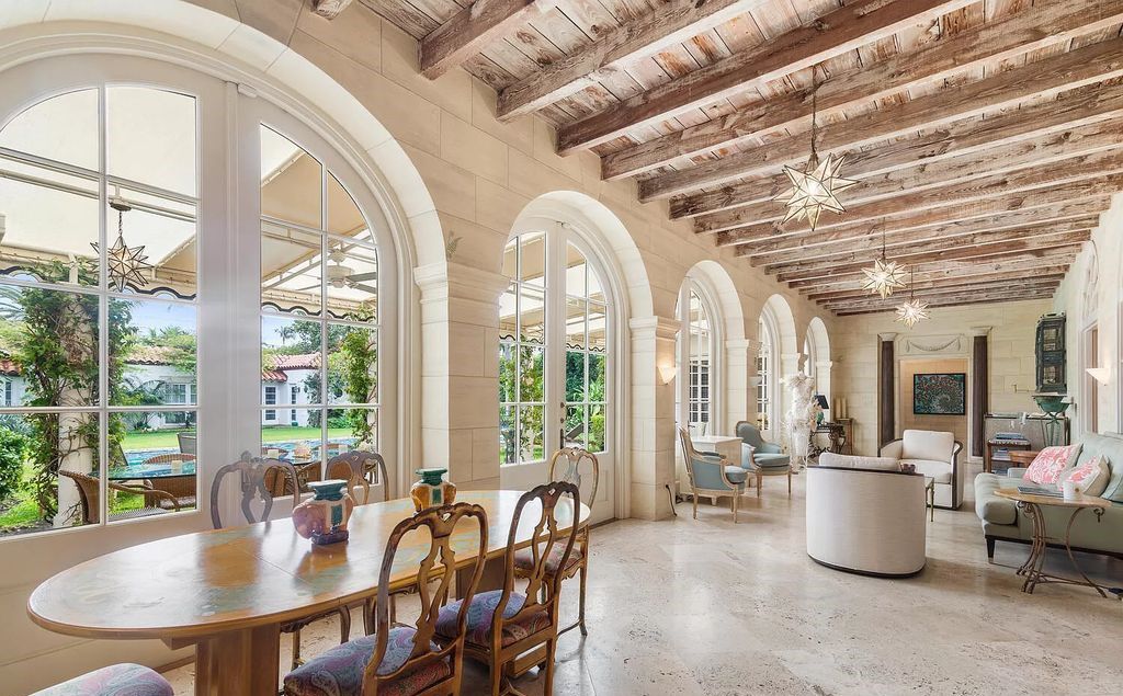 Designed by renowned architect John Volk, this magnificent residence, "The Ballroom," features 6 bedrooms, 6 bathrooms, and 5,612 square feet of living space on a 0.43-acre lot.
