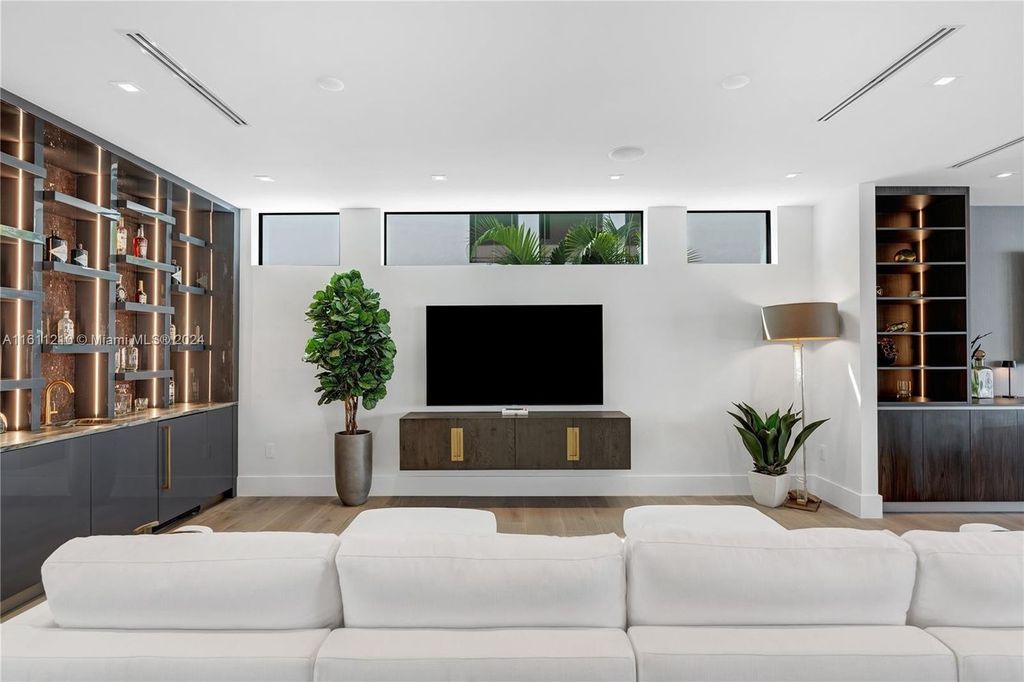 Discover your dream home at 1957 SE 21st Ave, Fort Lauderdale, Florida - a stunning new waterfront estate with ultra high-end finishes and designer furnishings.