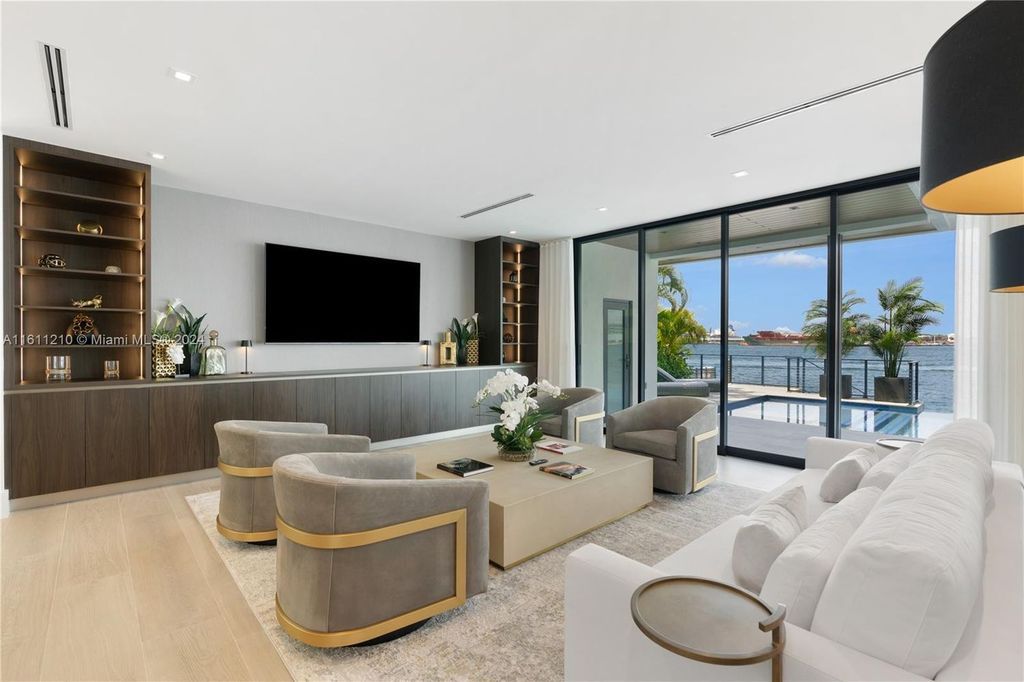 Discover your dream home at 1957 SE 21st Ave, Fort Lauderdale, Florida - a stunning new waterfront estate with ultra high-end finishes and designer furnishings.