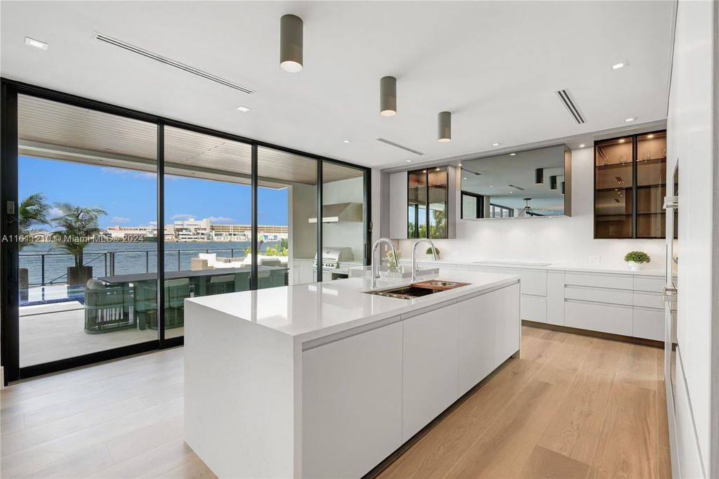 Discover your dream home at 1957 SE 21st Ave, Fort Lauderdale, Florida - a stunning new waterfront estate with ultra high-end finishes and designer furnishings.