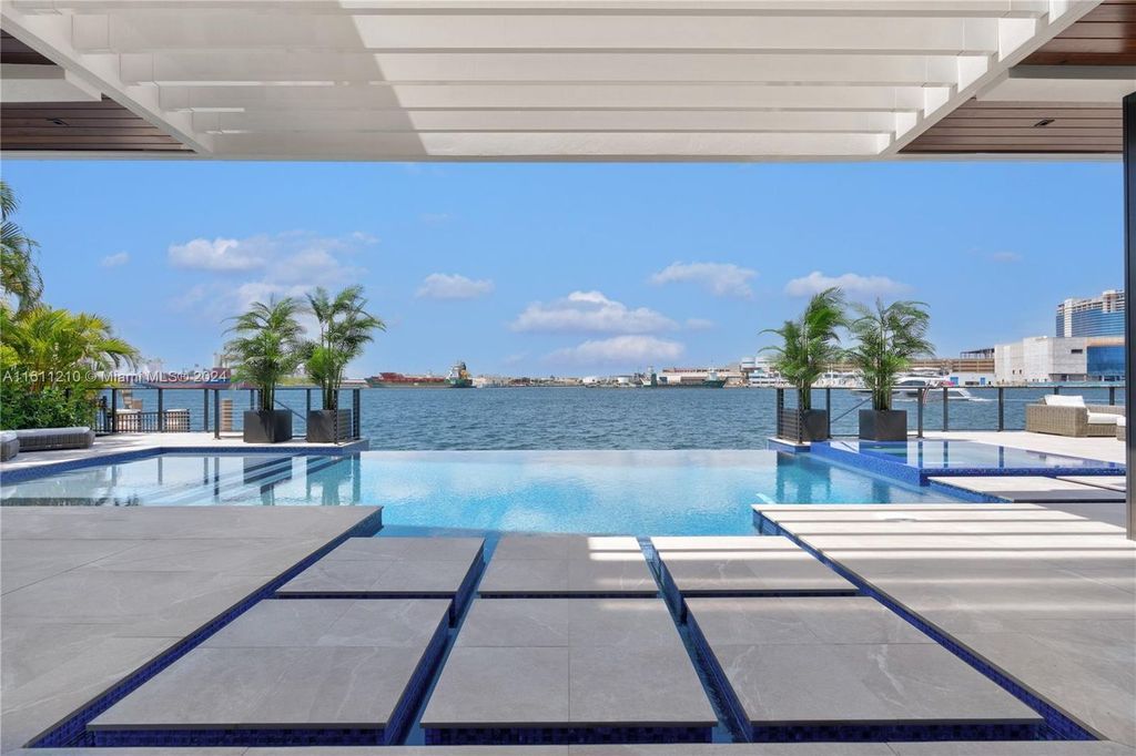 Discover your dream home at 1957 SE 21st Ave, Fort Lauderdale, Florida - a stunning new waterfront estate with ultra high-end finishes and designer furnishings.