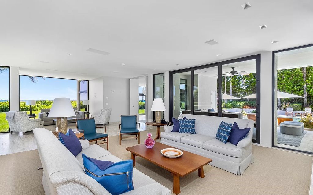 Welcome to an exquisite oceanfront estate located in the prestigious Palm Beach, Florida. This stunning property at 1446 N Ocean Blvd offers an unparalleled coastal living experience with 7 bedrooms and 5 bathrooms, spread across a luxurious 8,005 square feet of living space.