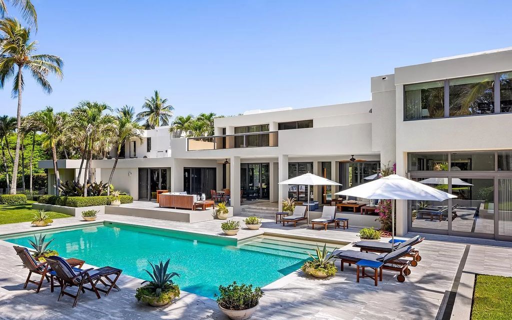 Welcome to an exquisite oceanfront estate located in the prestigious Palm Beach, Florida. This stunning property at 1446 N Ocean Blvd offers an unparalleled coastal living experience with 7 bedrooms and 5 bathrooms, spread across a luxurious 8,005 square feet of living space.