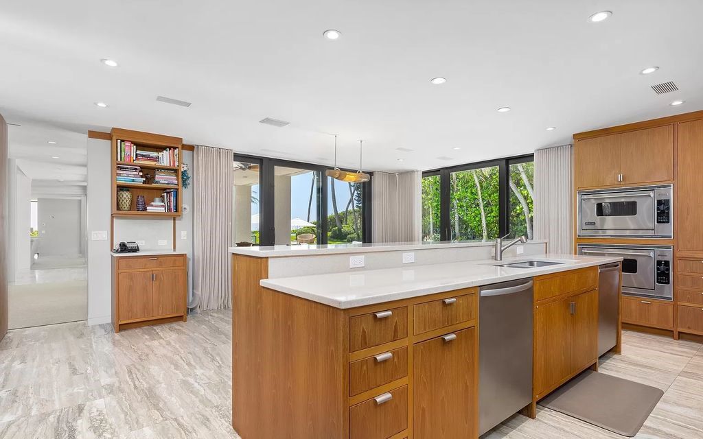 Welcome to an exquisite oceanfront estate located in the prestigious Palm Beach, Florida. This stunning property at 1446 N Ocean Blvd offers an unparalleled coastal living experience with 7 bedrooms and 5 bathrooms, spread across a luxurious 8,005 square feet of living space.