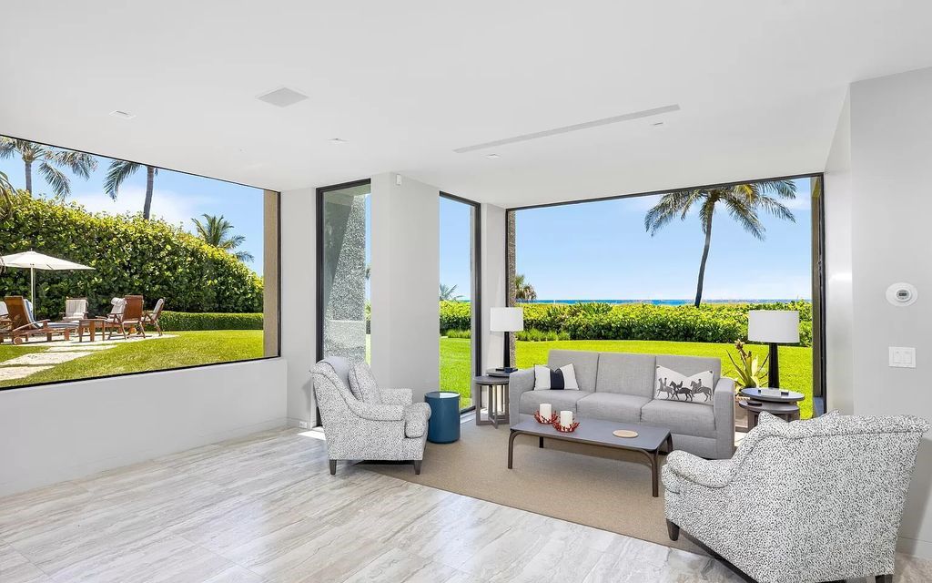 Welcome to an exquisite oceanfront estate located in the prestigious Palm Beach, Florida. This stunning property at 1446 N Ocean Blvd offers an unparalleled coastal living experience with 7 bedrooms and 5 bathrooms, spread across a luxurious 8,005 square feet of living space.