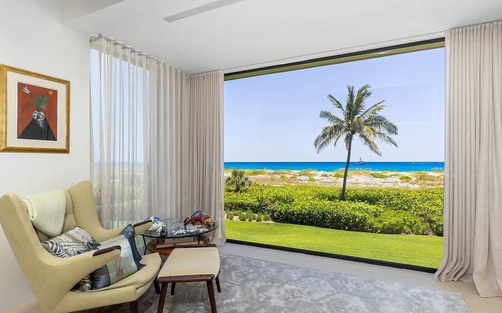 Welcome to an exquisite oceanfront estate located in the prestigious Palm Beach, Florida. This stunning property at 1446 N Ocean Blvd offers an unparalleled coastal living experience with 7 bedrooms and 5 bathrooms, spread across a luxurious 8,005 square feet of living space.