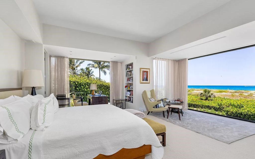Welcome to an exquisite oceanfront estate located in the prestigious Palm Beach, Florida. This stunning property at 1446 N Ocean Blvd offers an unparalleled coastal living experience with 7 bedrooms and 5 bathrooms, spread across a luxurious 8,005 square feet of living space.