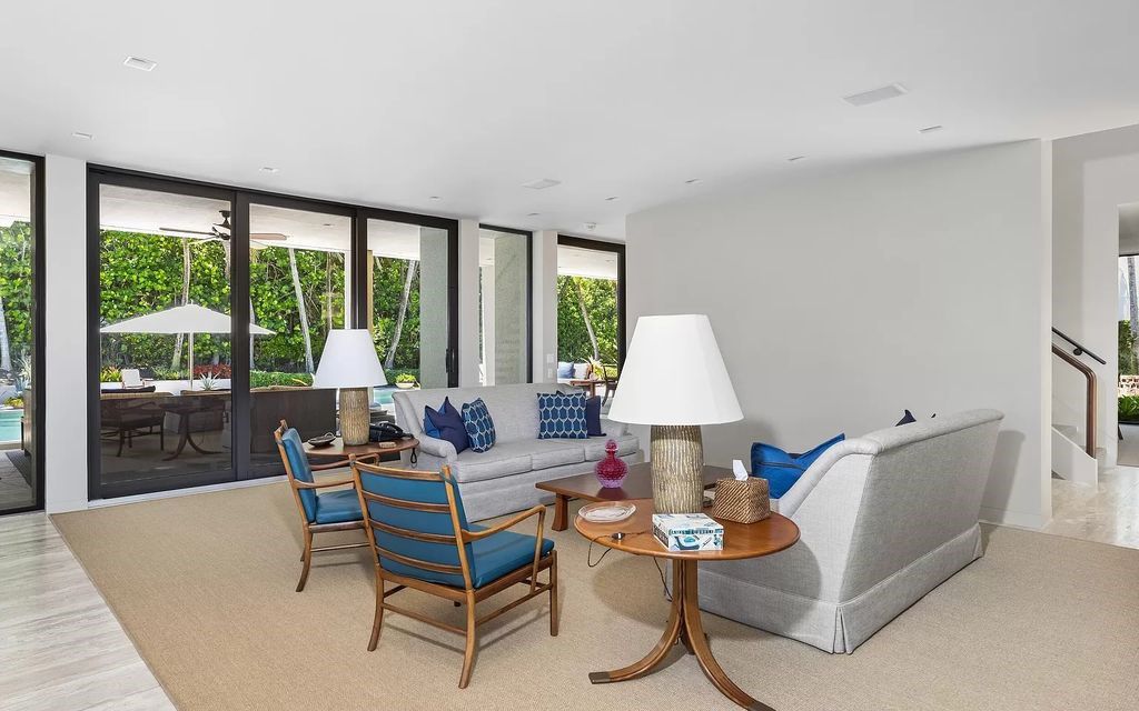 Welcome to an exquisite oceanfront estate located in the prestigious Palm Beach, Florida. This stunning property at 1446 N Ocean Blvd offers an unparalleled coastal living experience with 7 bedrooms and 5 bathrooms, spread across a luxurious 8,005 square feet of living space.