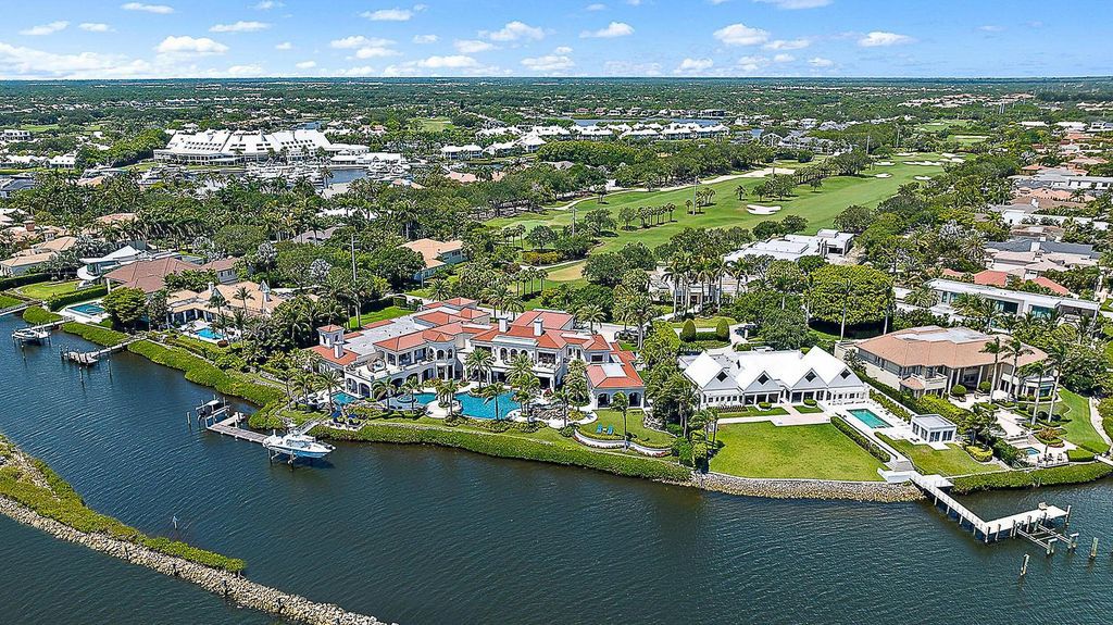 Nestled within the prestigious Admirals Cove community, this Ultimate Trophy Property, originally completed in 2016 and newly remodeled in 2023, offers unparalleled luxury and coastal living.