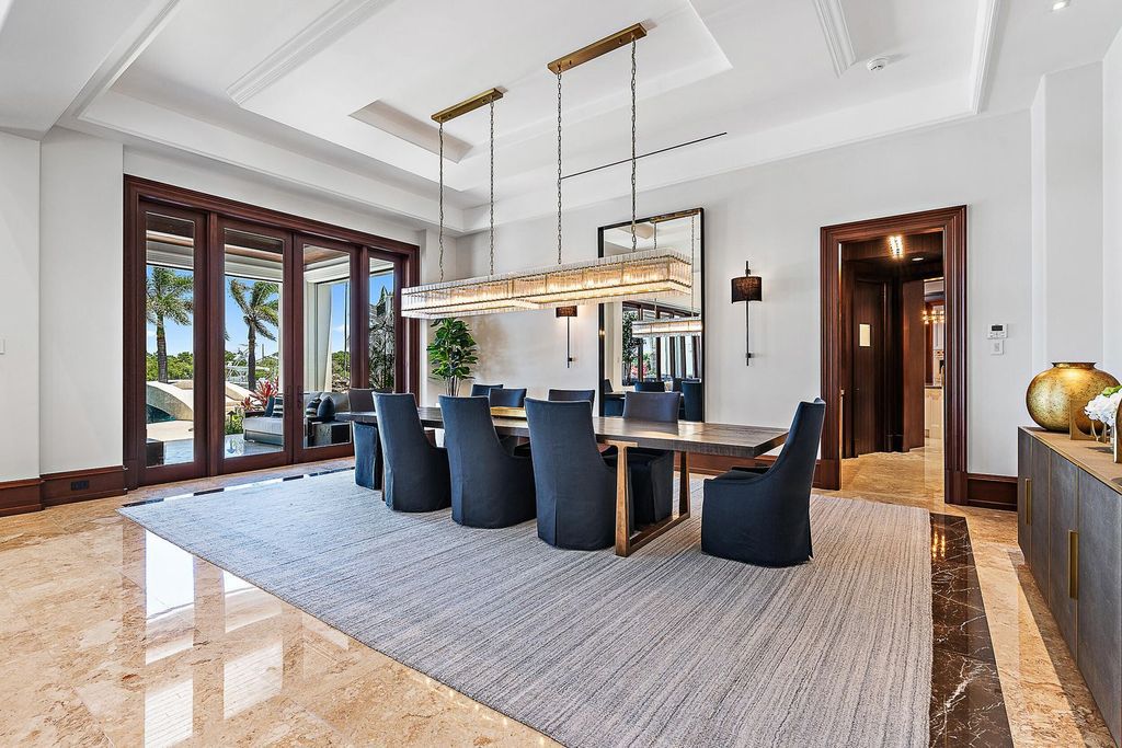 Nestled within the prestigious Admirals Cove community, this Ultimate Trophy Property, originally completed in 2016 and newly remodeled in 2023, offers unparalleled luxury and coastal living.